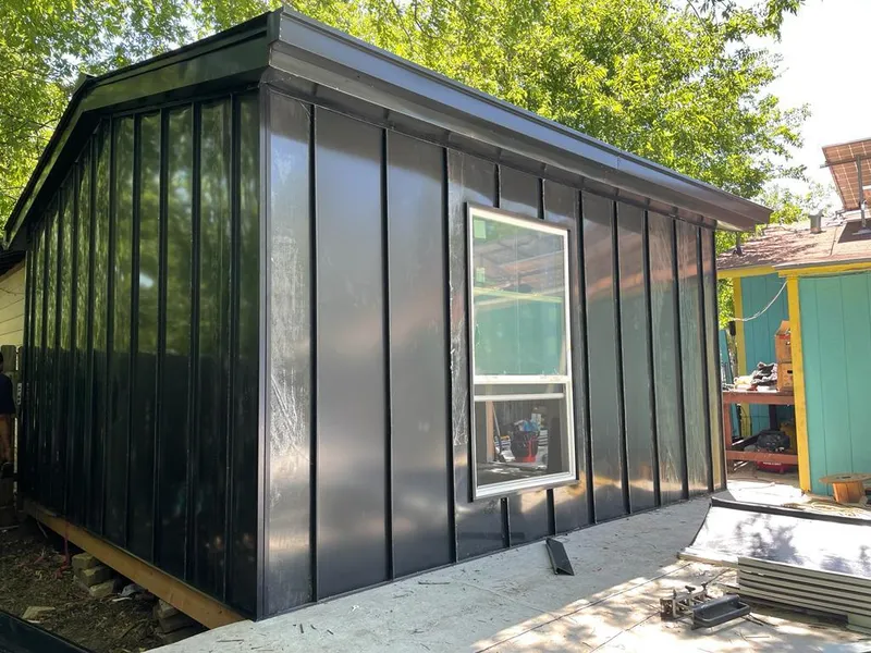 Black standing seam metal wall panels for Roof Inspection in Fairfield